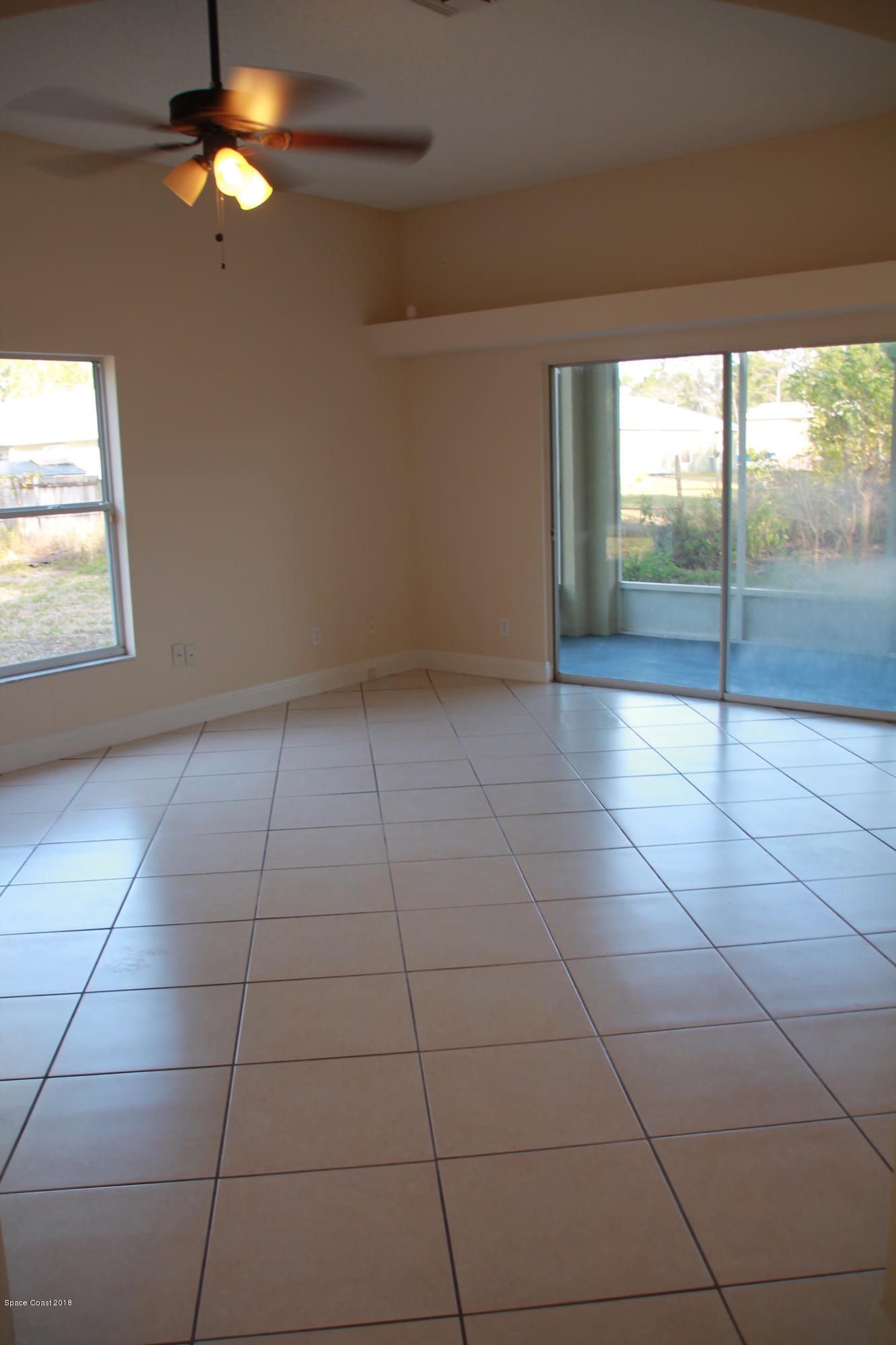 771 Titan Road Southeast Palm Bay, FL 32909 - Photo 7 of 19 Family Room