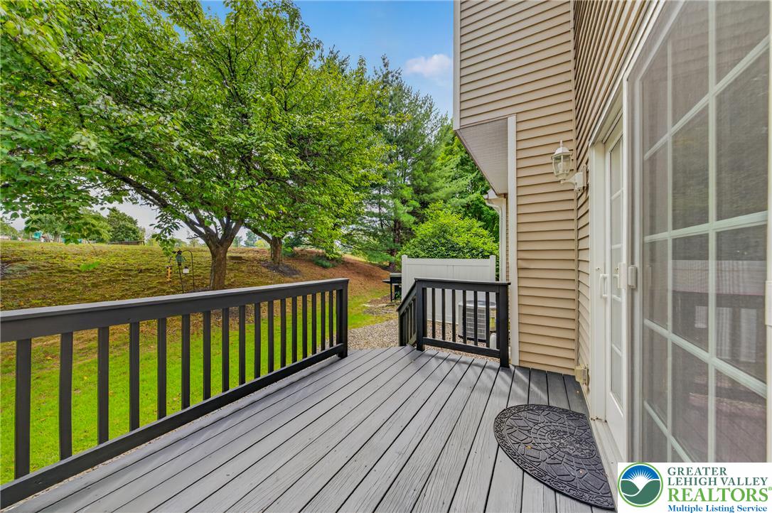 4236 Creek Road Allentown, PA 18104 - Photo 39 of 47 Sliding doors open to a spacious deck overlooking mature trees.
