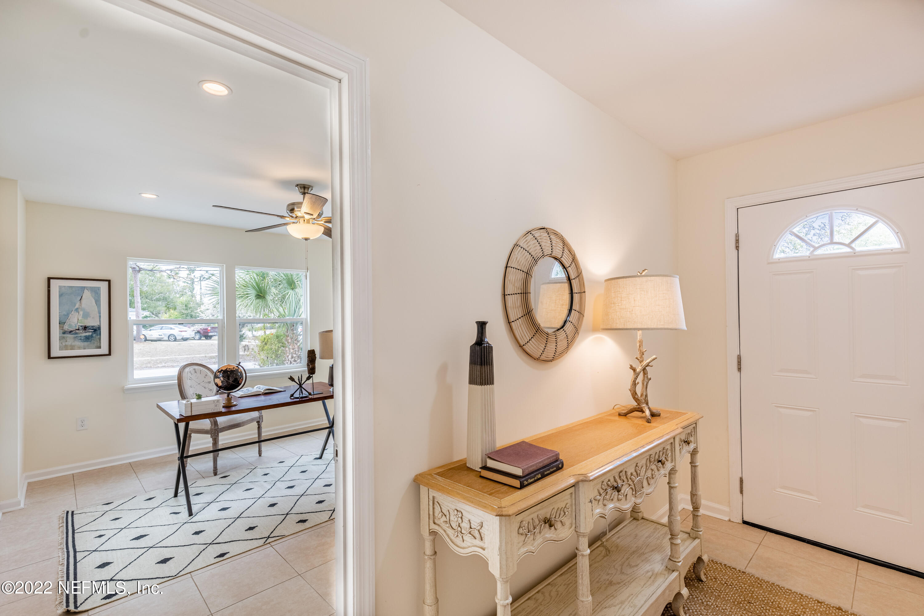 2913 Mansion Road Jacksonville, FL 32277 - Photo 12 of 30 a living room with furniture and a window