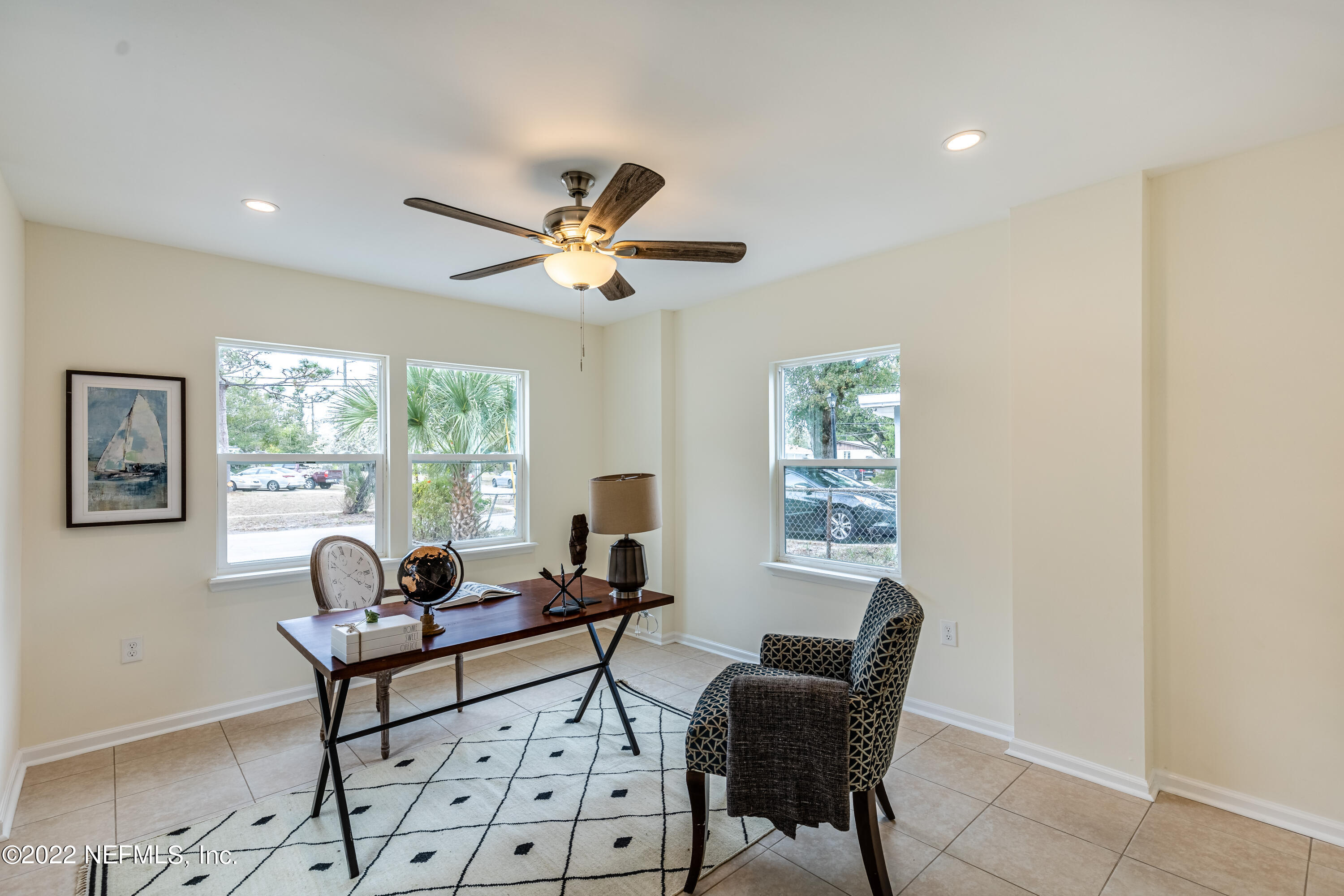 2913 Mansion Road Jacksonville, FL 32277 - Photo 13 of 30 a living room with furniture and a large window