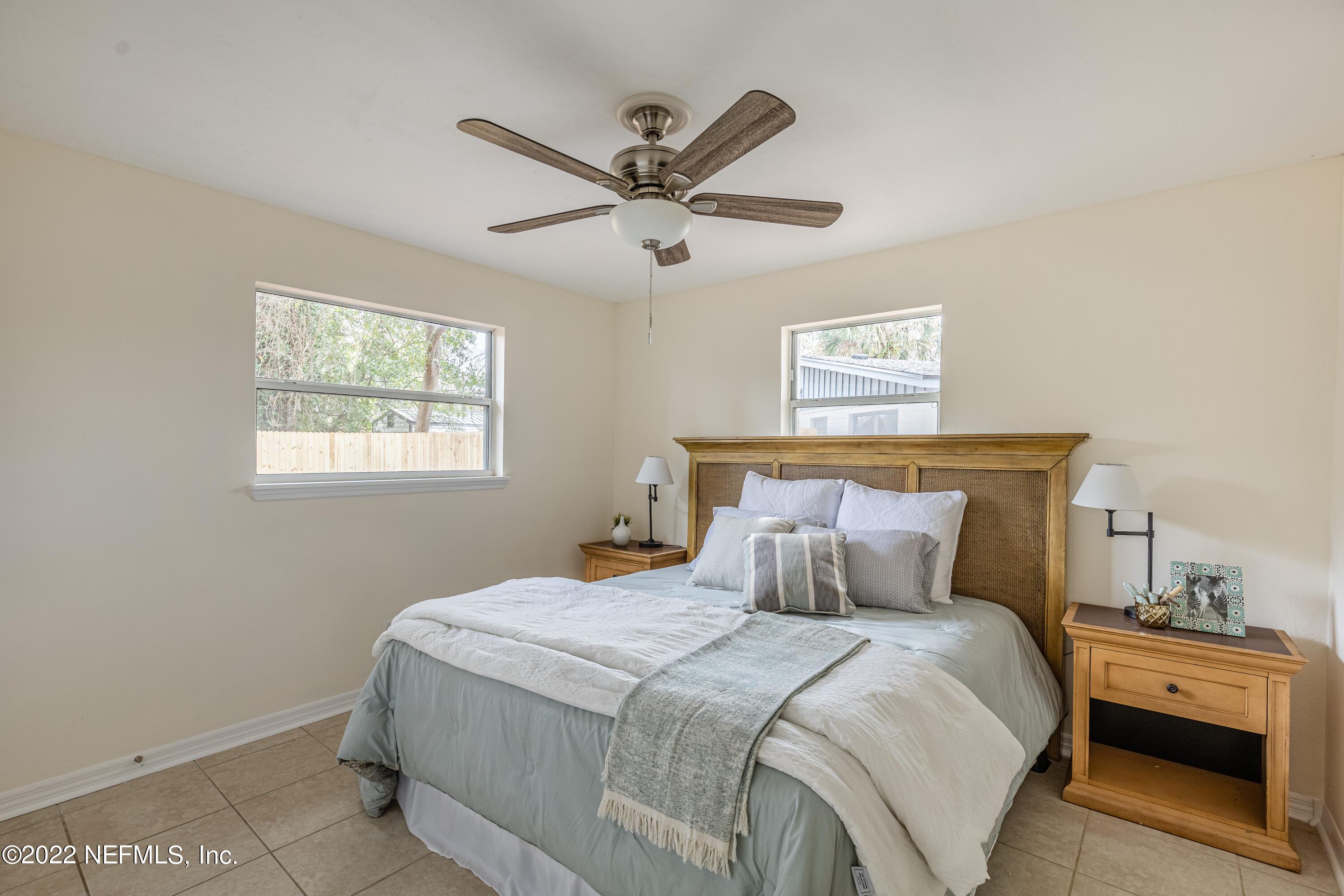 2913 Mansion Road Jacksonville, FL 32277 - Photo 15 of 30 a bedroom with a bed and window