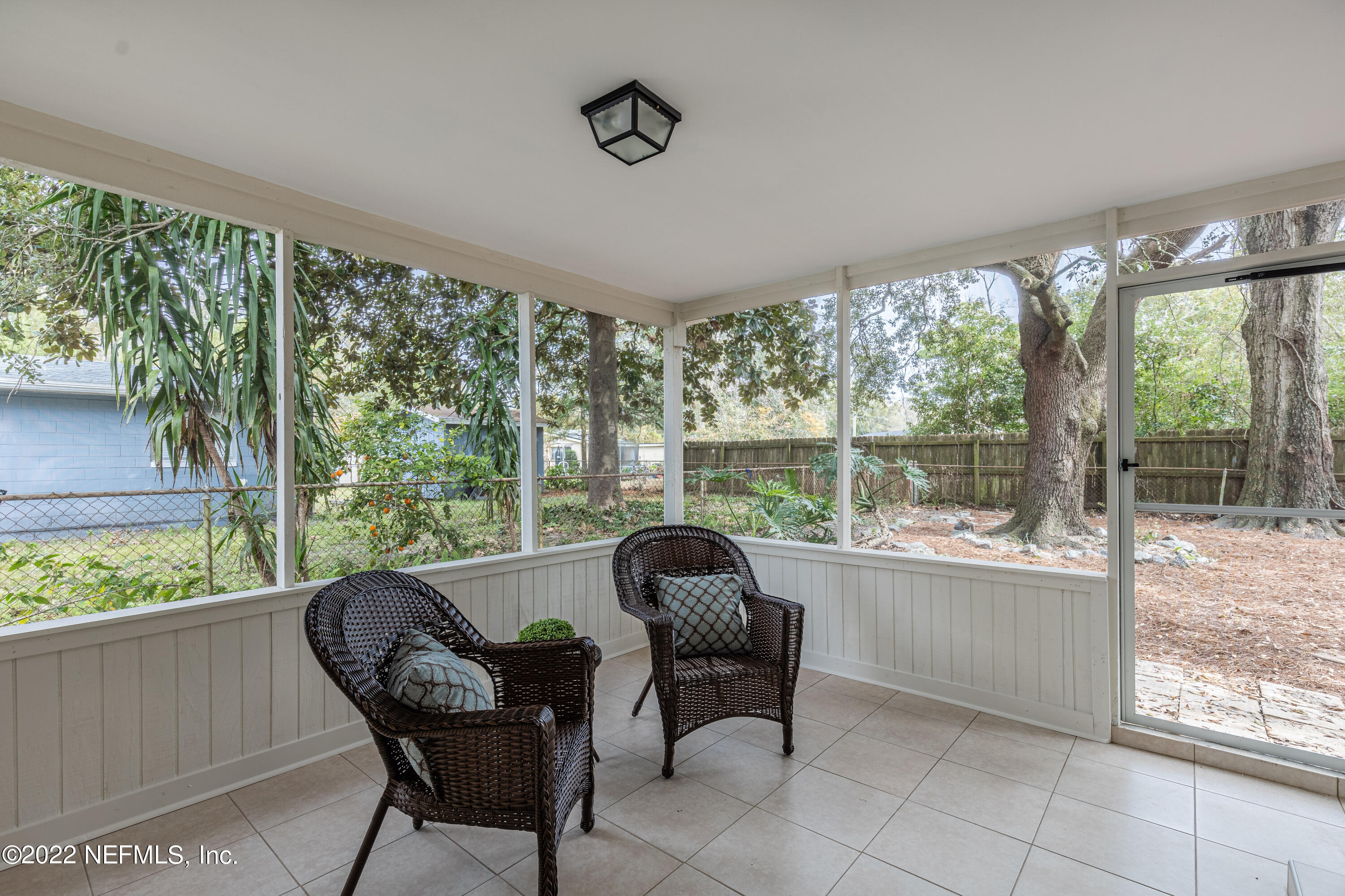 2913 Mansion Road Jacksonville, FL 32277 - Photo 25 of 30 a living room with furniture and a window