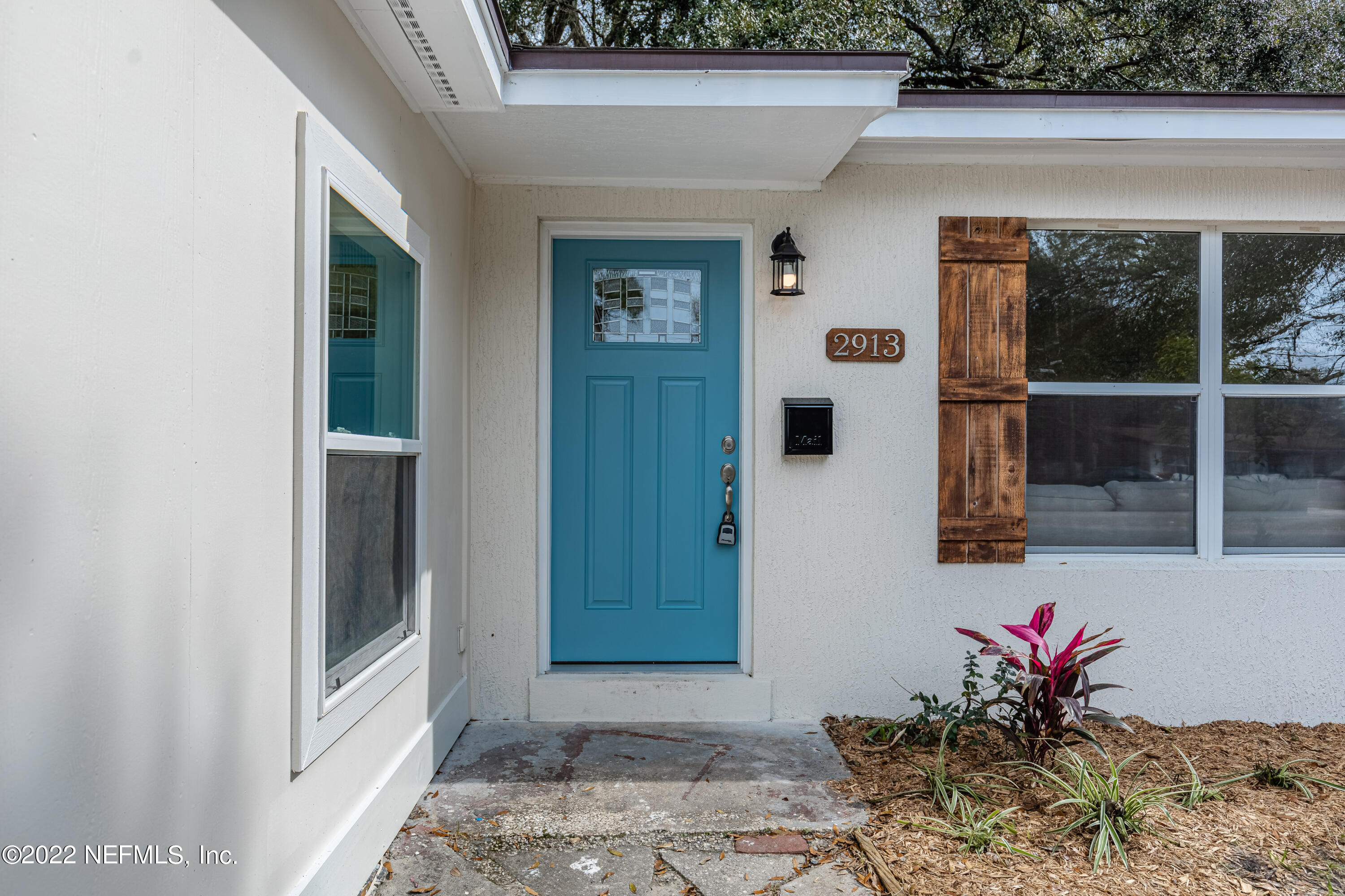 2913 Mansion Road Jacksonville, FL 32277 - Photo 4 of 30 a view of a entryway door front of house