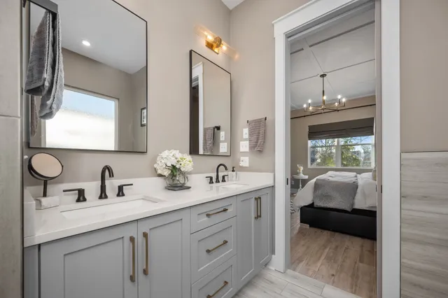 a bathroom with a sink and a shower