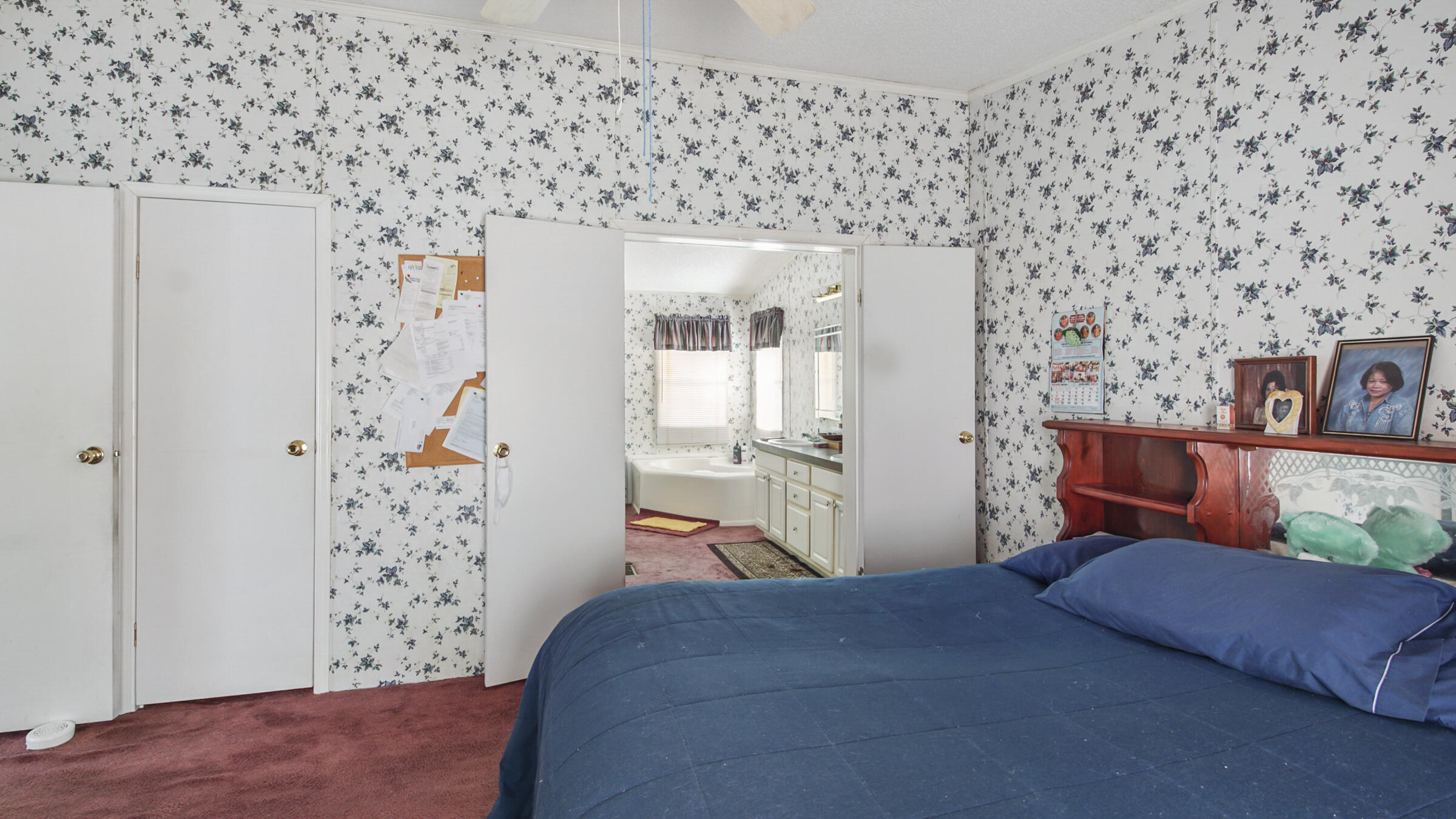 452 Wee Acres Road DeFuniak Springs, FL 32433 - Photo 8 of 23 a bedroom with a bed and a couch