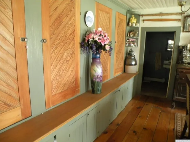 a view of outdoor space with green field and trees all around