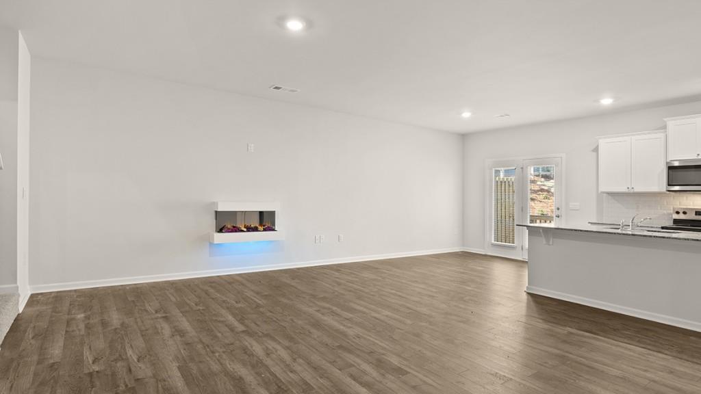 49 Rustin Ridge Dahlonega, GA 30533 - Photo 8 of 27 a view of empty room with wooden floor