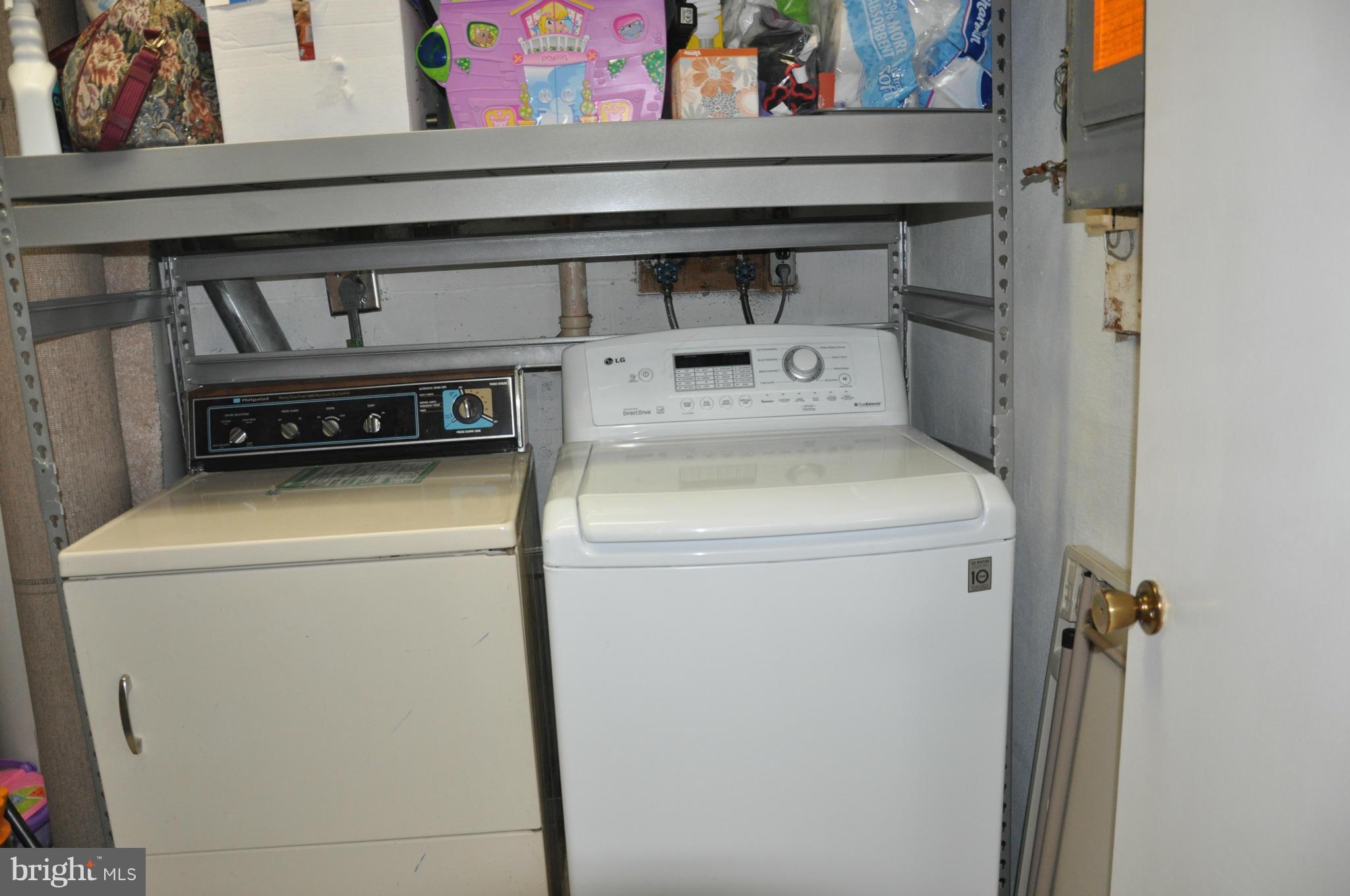 7938 Spring Forest Court, Unit 7938 Springfield, VA 22152 - Photo 15 of 29 a utility room with dryer and washer