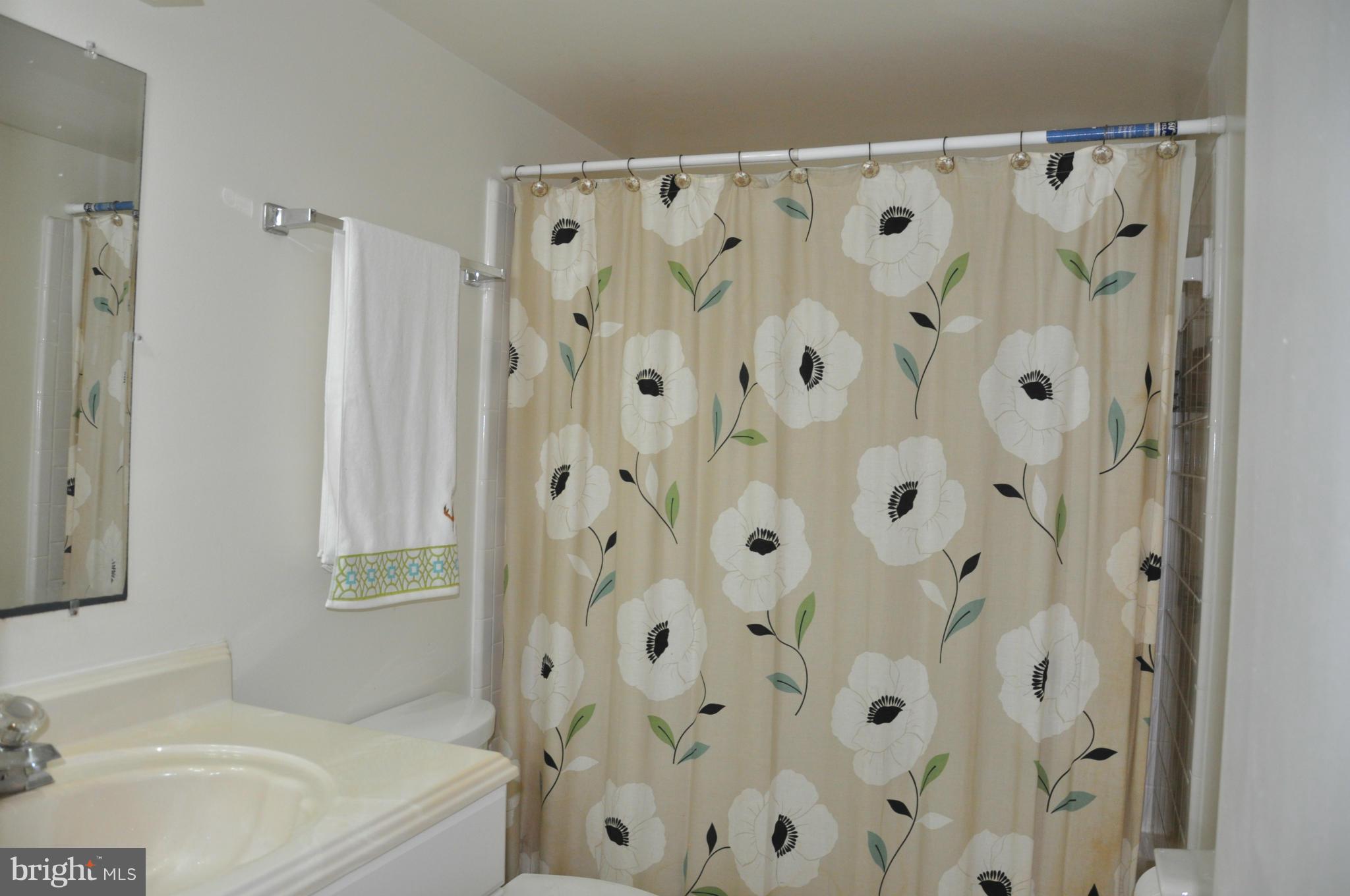 7938 Spring Forest Court, Unit 7938 Springfield, VA 22152 - Photo 24 of 29 a bathroom with a bathtub and shower