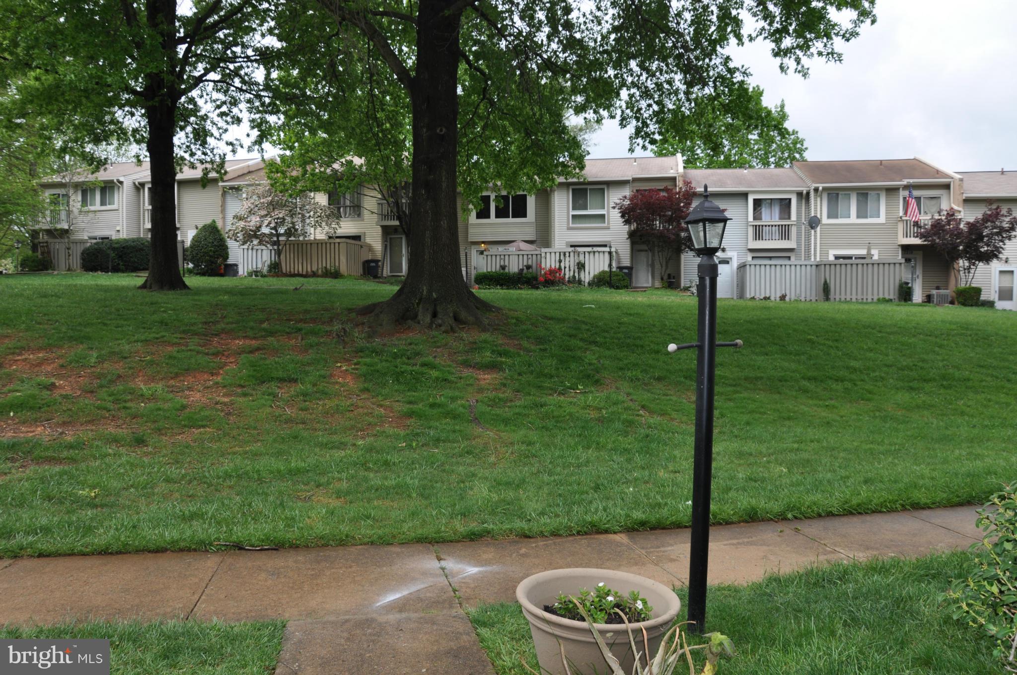 7938 Spring Forest Court, Unit 7938 Springfield, VA 22152 - Photo 25 of 29 a house view with a garden space