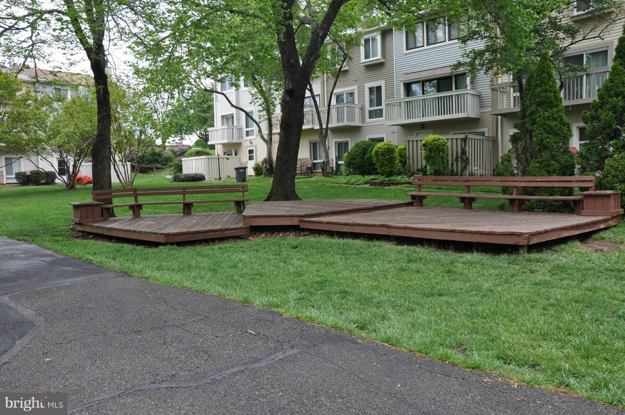 7938 Spring Forest Court, Unit 7938 Springfield, VA 22152 - Photo 26 of 29 a view of a house with a backyard