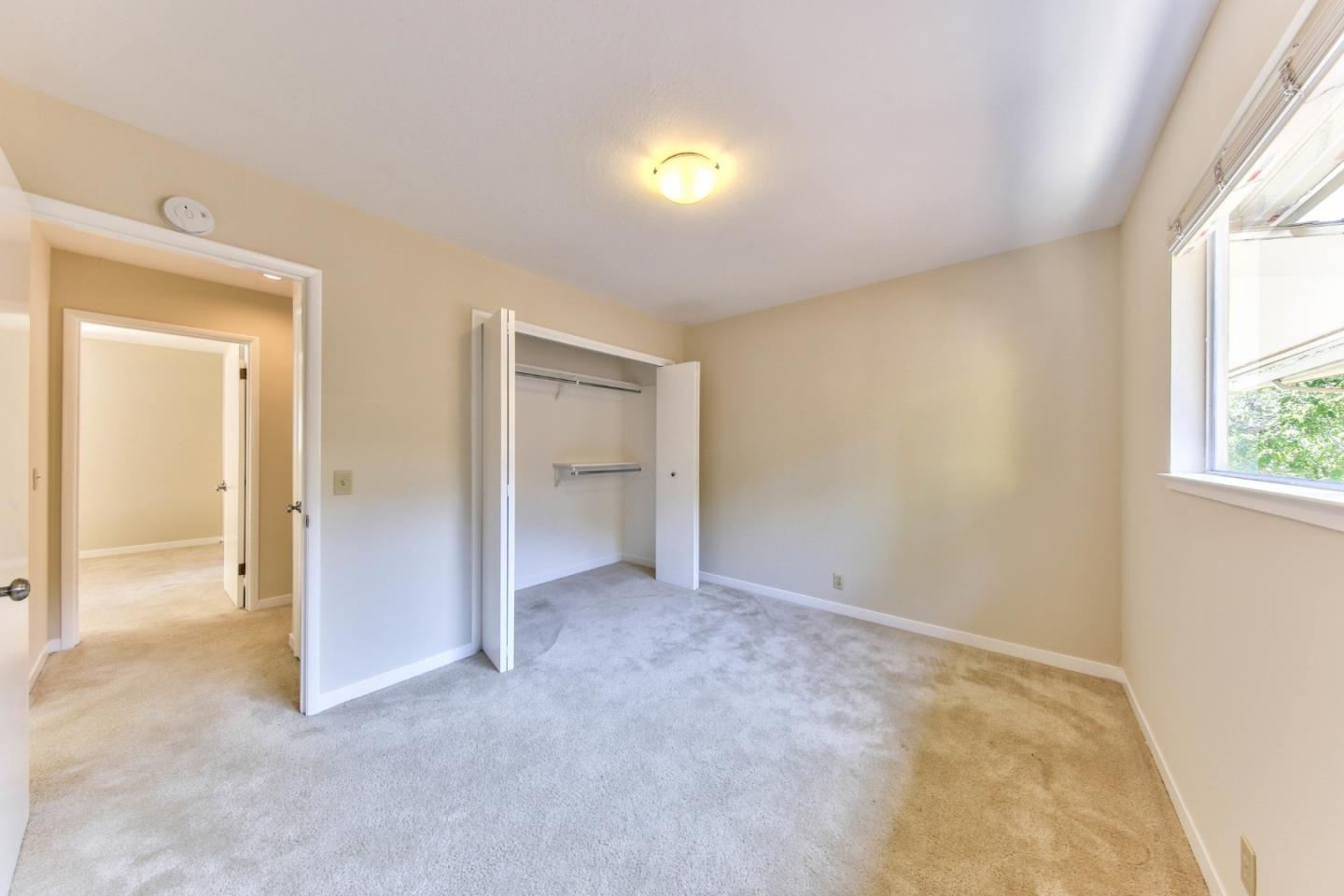 0 Junipero 4 Nw 10th Avenue Carmel, CA 93921 - Photo 17 of 22 an empty room with windows and closet