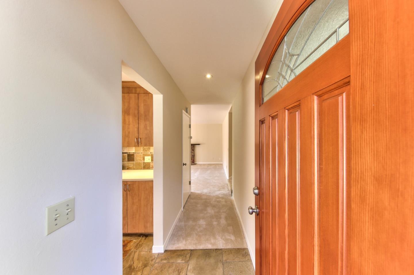 0 Junipero 4 Nw 10th Avenue Carmel, CA 93921 - Photo 3 of 22 a view of a hallway with wooden floor and a bathroom