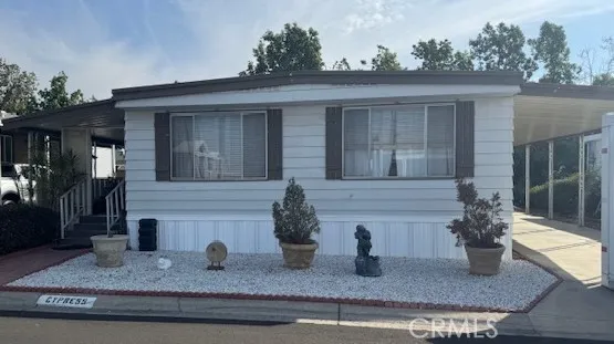 a house view with a outdoor space