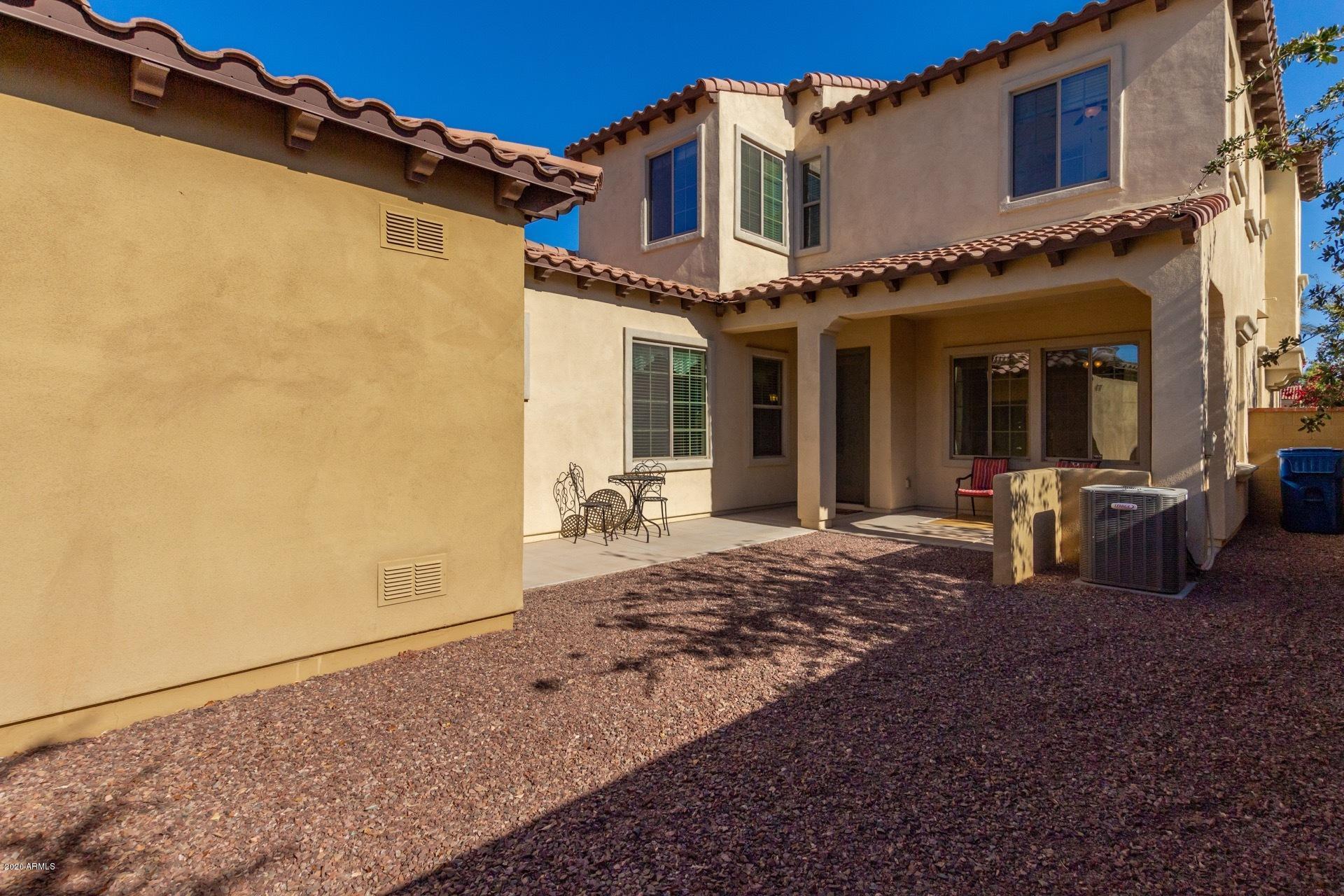 4280 North Verrado Way Buckeye, AZ 85396 - Photo 17 of 41 a view of a house with backyard and porch