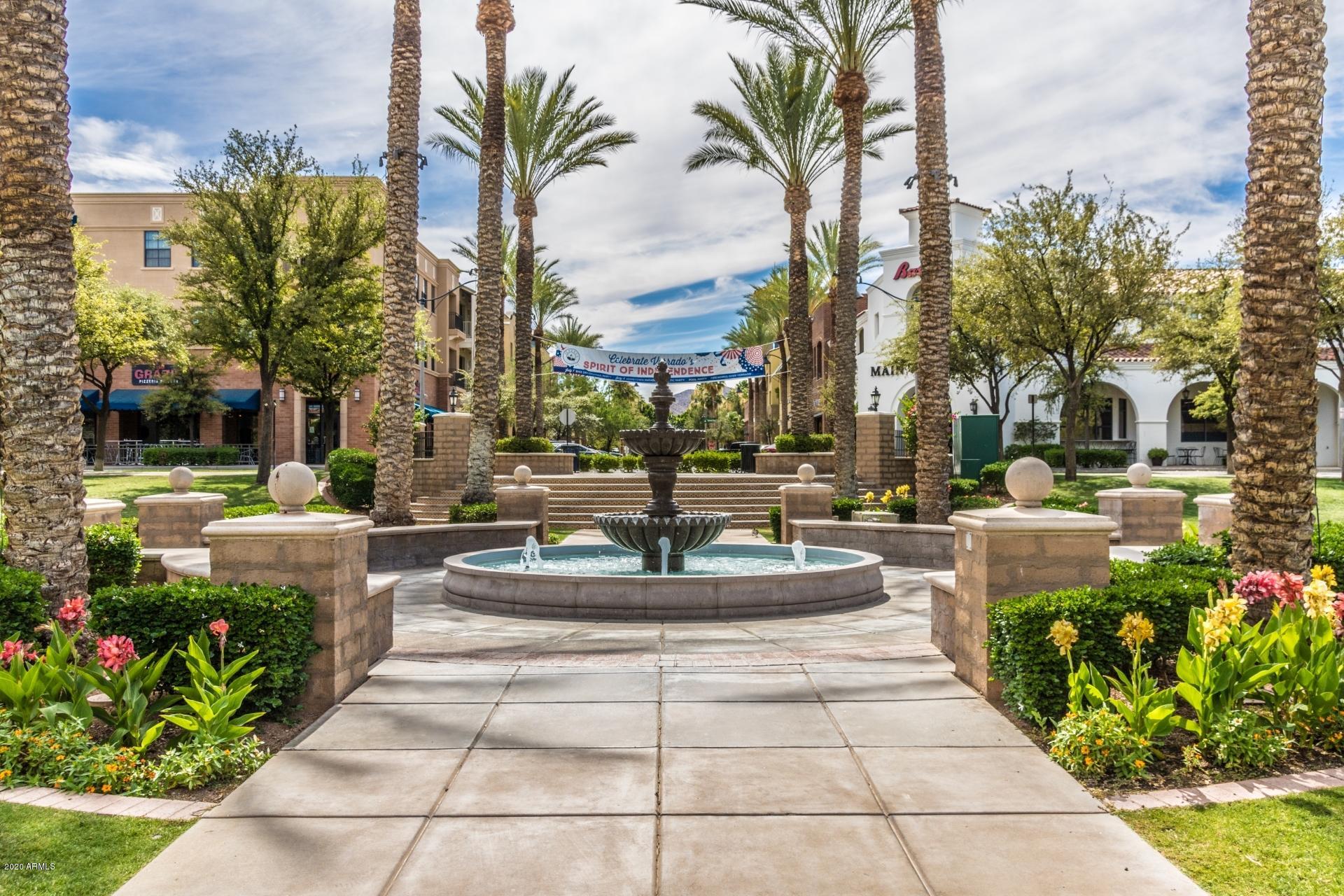 4280 North Verrado Way Buckeye, AZ 85396 - Photo 24 of 41 a view of a fountain in front of a building
