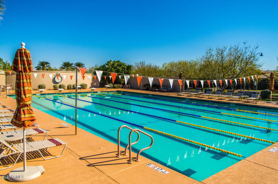 4280 North Verrado Way Buckeye, AZ 85396 - Photo 30 of 41 a view of a tennis ground with large trees