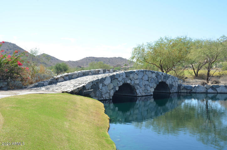 4280 North Verrado Way Buckeye, AZ 85396 - Photo 33 of 41 a view of a lake with a mountain
