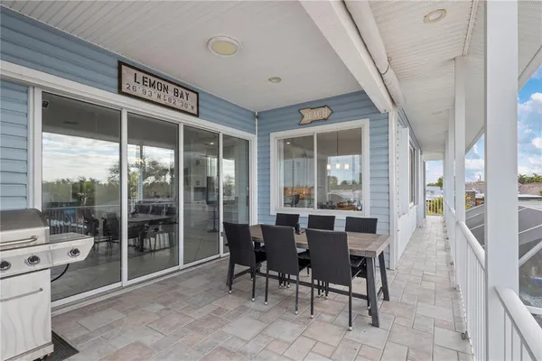 a view of a swimming pool with a patio