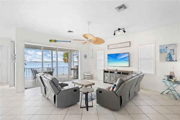 a view of a dining room and a table chairs
