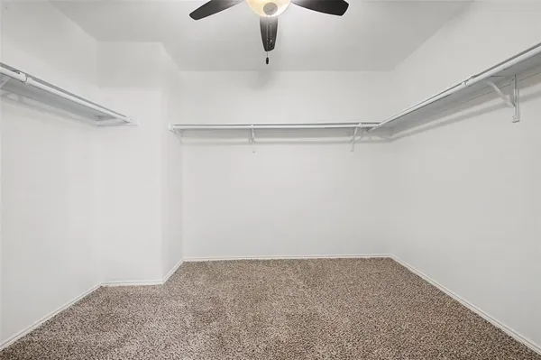 a view of a room with racks on the wall