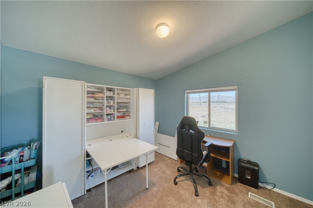 2931 Rio Rancho Drive, Unit 4 Pahrump, NV 89048 - Photo 14 of 21 An inviting den/craft space with lovely views