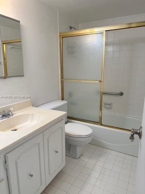 3910 Inverrary Boulevard, Unit 407B Lauderhill, FL 33319 - Photo 14 of 28 a bathroom with a granite countertop sink toilet and shower