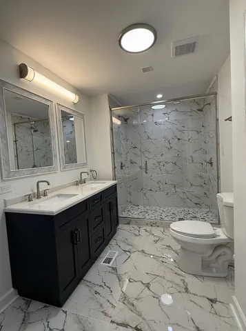 a spacious bathroom with a bathtub and sink