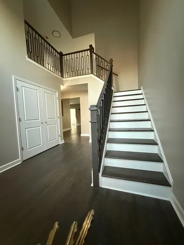 a view of entryway with wooden floor