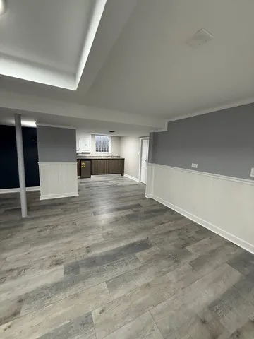 a bathroom with a shower toilet and sink