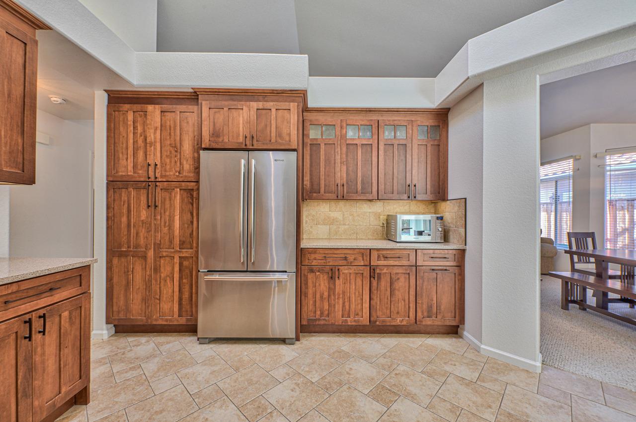 17644 River Run Road Salinas, CA 93908 - Photo 16 of 41 a kitchen with stainless steel appliances granite countertop a refrigerator and a sink