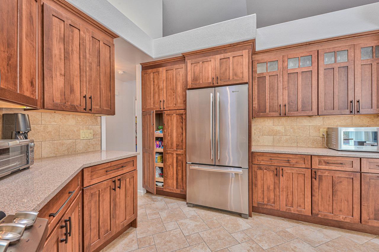17644 River Run Road Salinas, CA 93908 - Photo 17 of 41 a kitchen with stainless steel appliances granite countertop a refrigerator and a sink