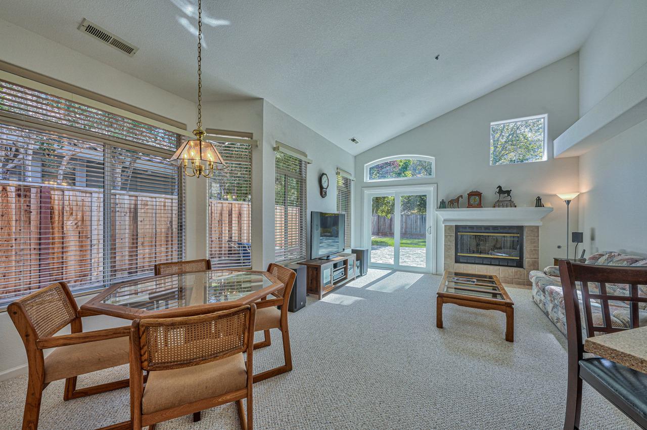 17644 River Run Road Salinas, CA 93908 - Photo 19 of 41 a dining room with furniture and a fireplace