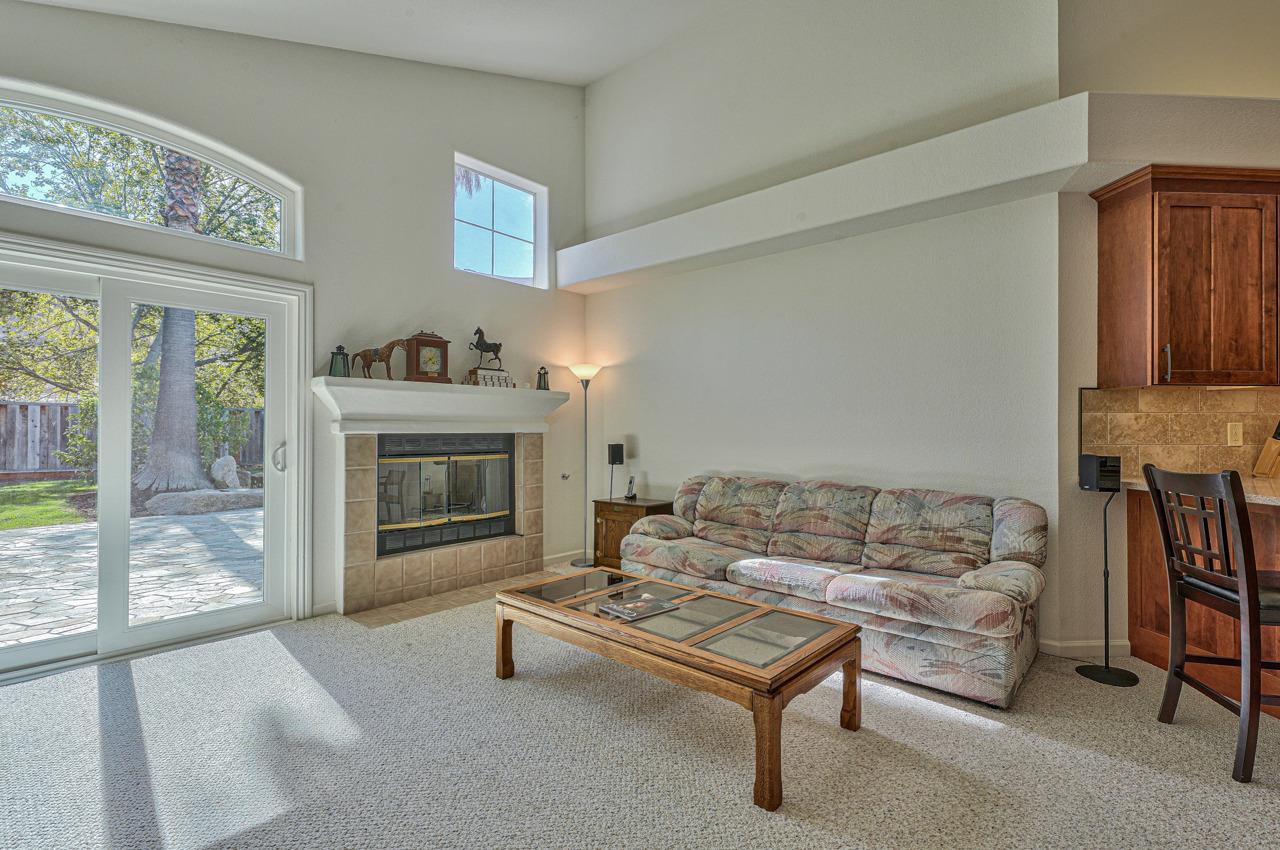 17644 River Run Road Salinas, CA 93908 - Photo 21 of 41 a living room with furniture and a fireplace