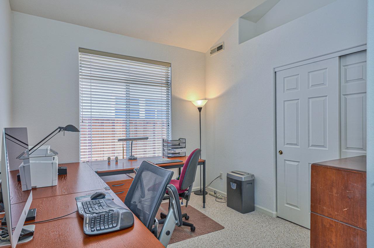 17644 River Run Road Salinas, CA 93908 - Photo 31 of 41 a living room with furniture a rug and a window
