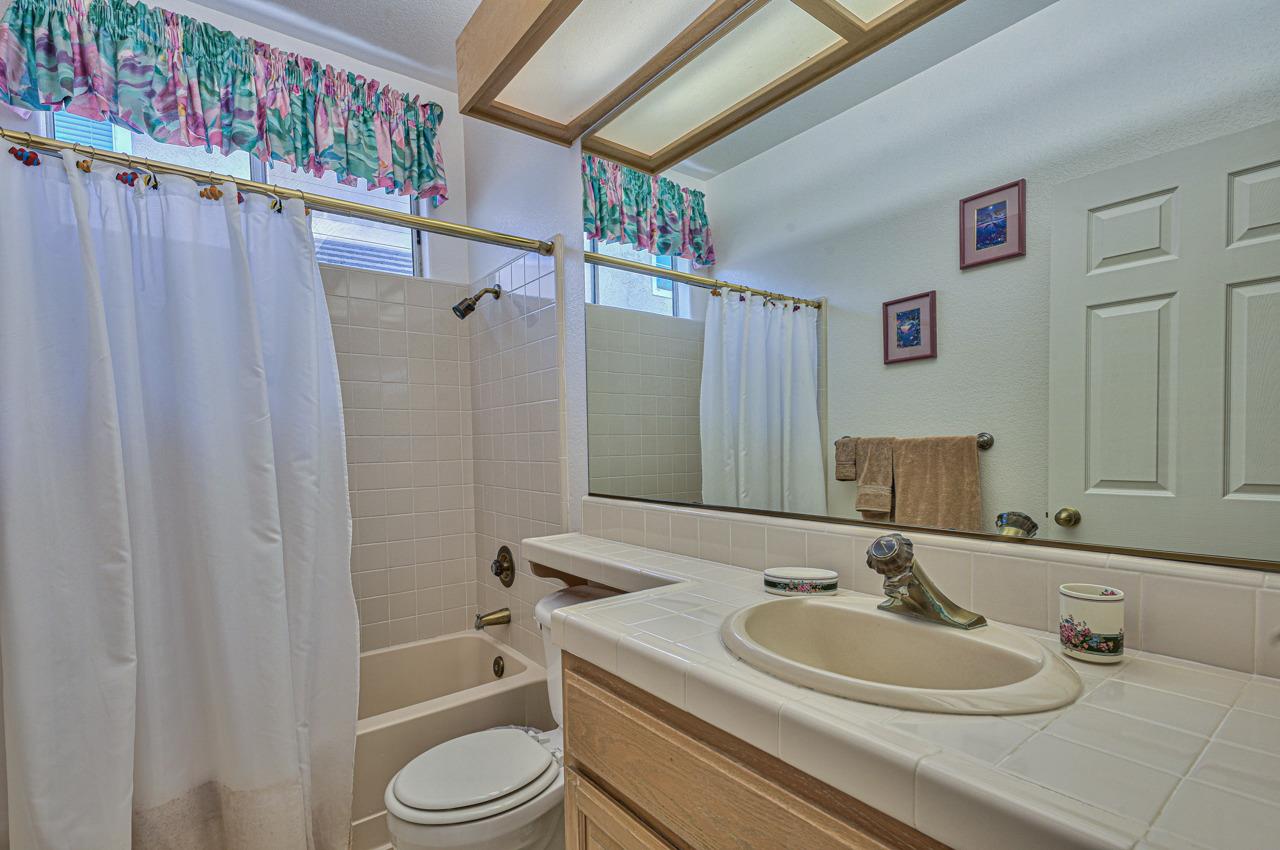 17644 River Run Road Salinas, CA 93908 - Photo 36 of 41 a bathroom with a sink toilet and shower