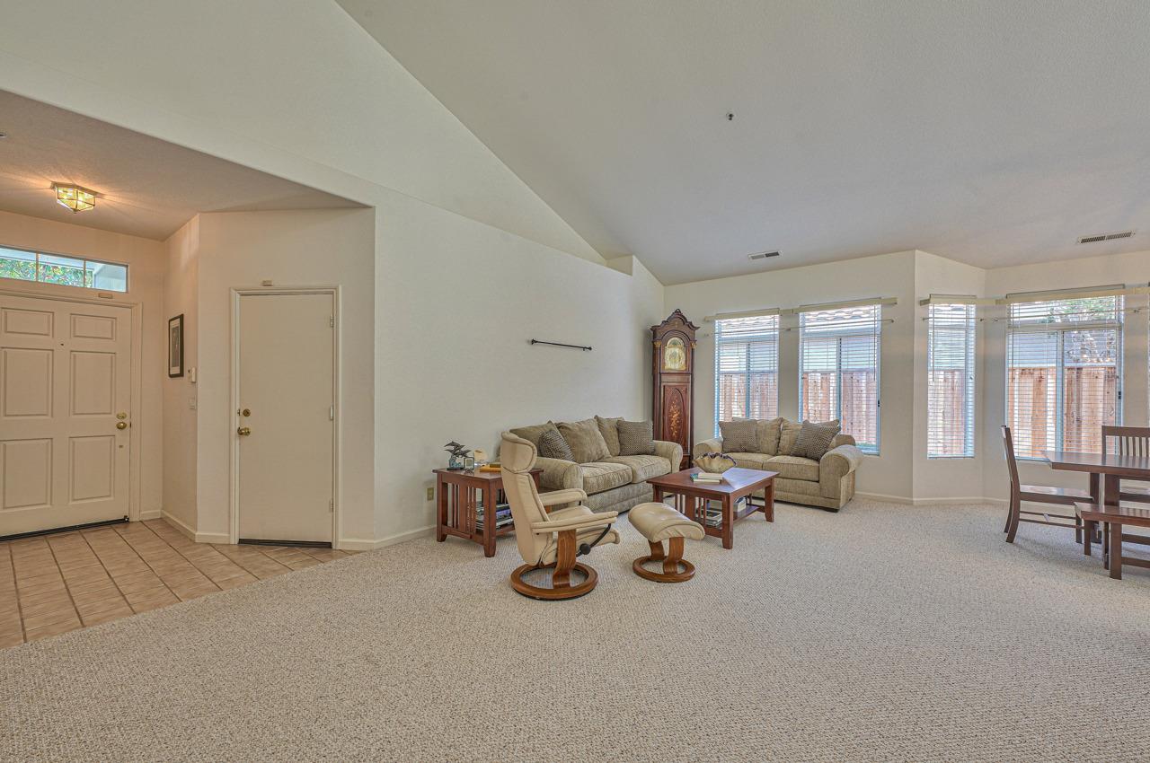 17644 River Run Road Salinas, CA 93908 - Photo 6 of 41 a living room with furniture and a large window