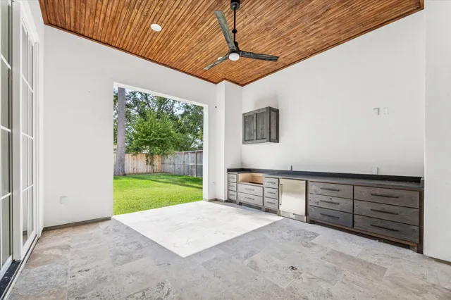 a bathroom with a sink vanity granite and a mirror