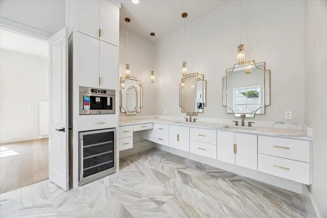 a spacious bathroom with a bathtub shower and toilet