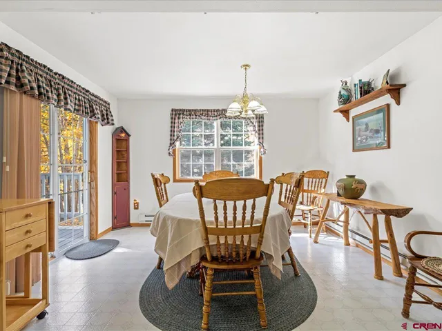 a view of a livingroom with furniture window and outside view