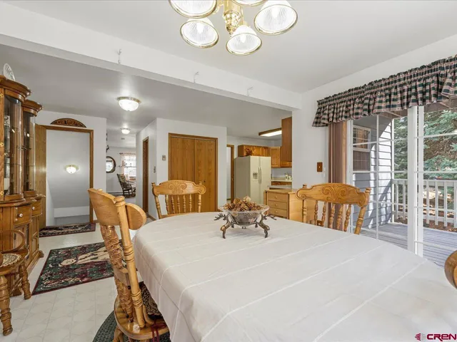 a large bedroom with a large bed and furniture