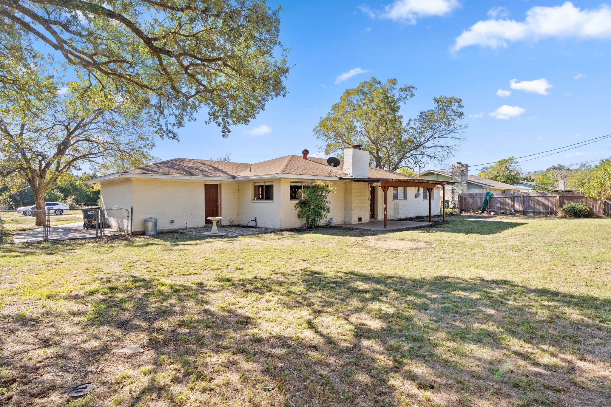 418 Hernandos Loop Leander, TX 78641 - Photo 24 of 24 a front view of a house with a garden