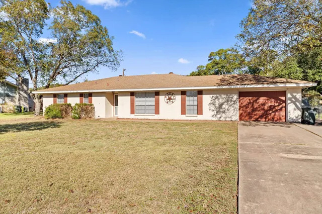 a view of a livingroom with wooden floor