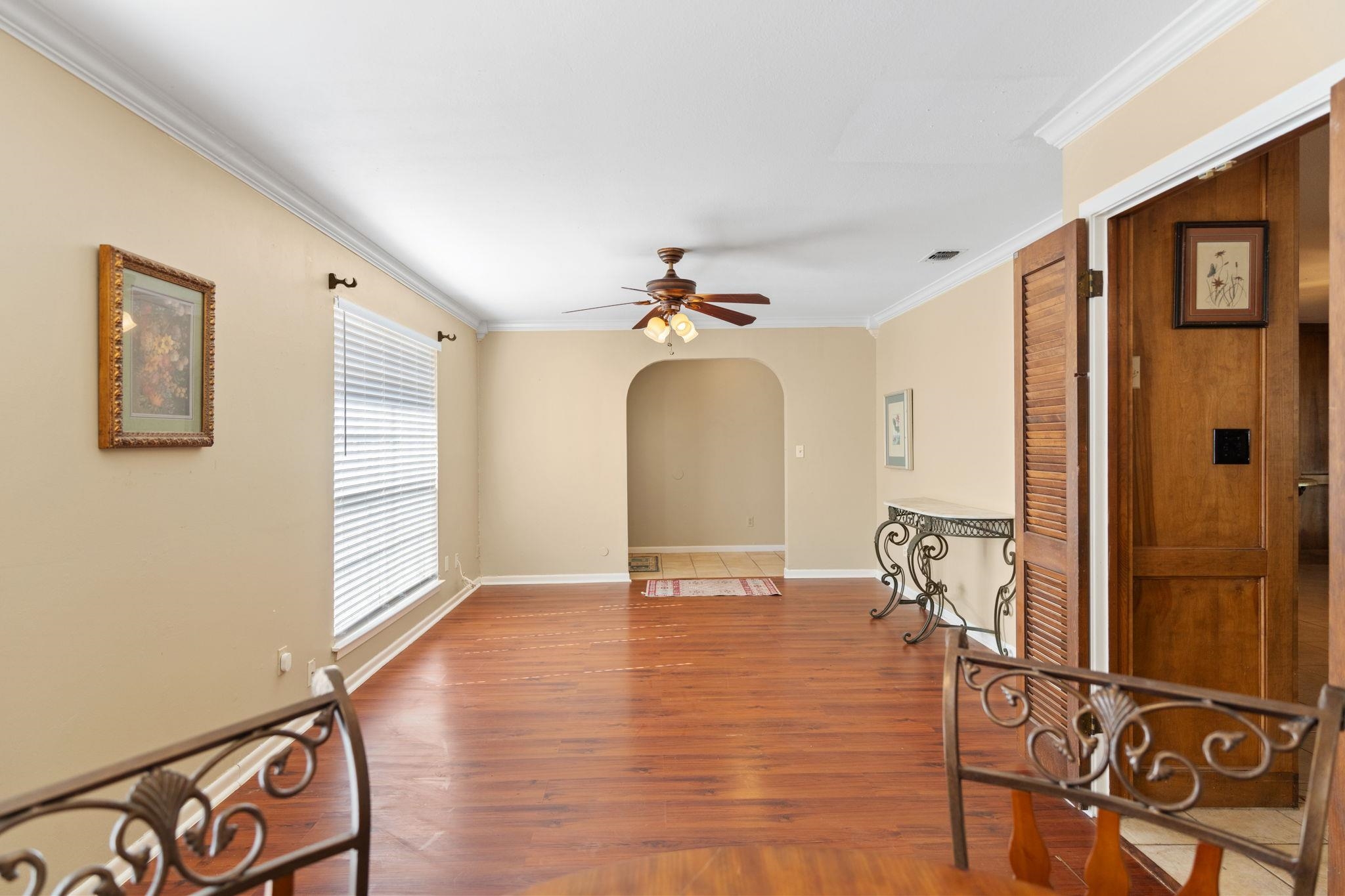 418 Hernandos Loop Leander, TX 78641 - Photo 6 of 24 a view of a livingroom with wooden floor and a ceiling fan