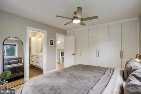 a bathroom with a double vanity sink and mirror