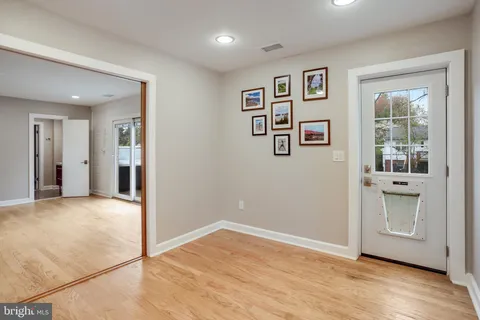 a bathroom with a sink a mirror and a shower