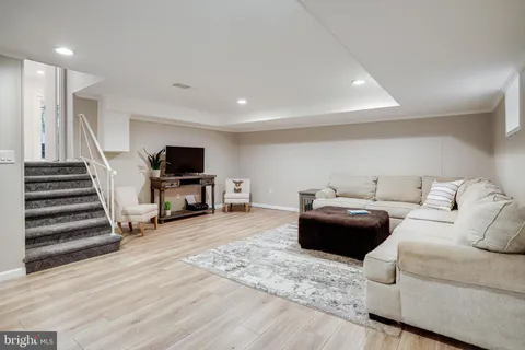 a view of house with a chairs in patio