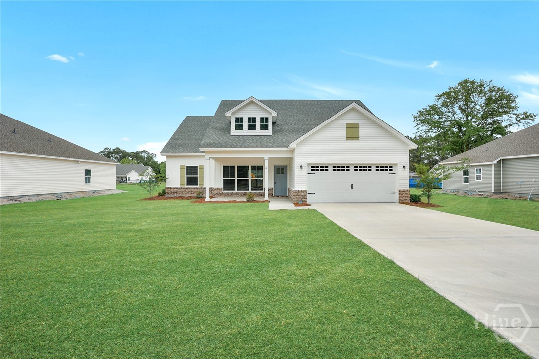 79 Ennis Road Pembroke, GA 31321 - Photo 2 of 41 Grass has been digitally enhanced for marketing purposes.