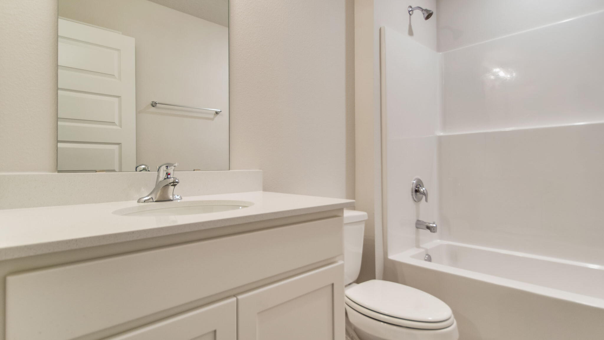 8701 Bluebell Street Milton, FL 32583 - Photo 30 of 32 a bathroom with a sink a toilet and shower