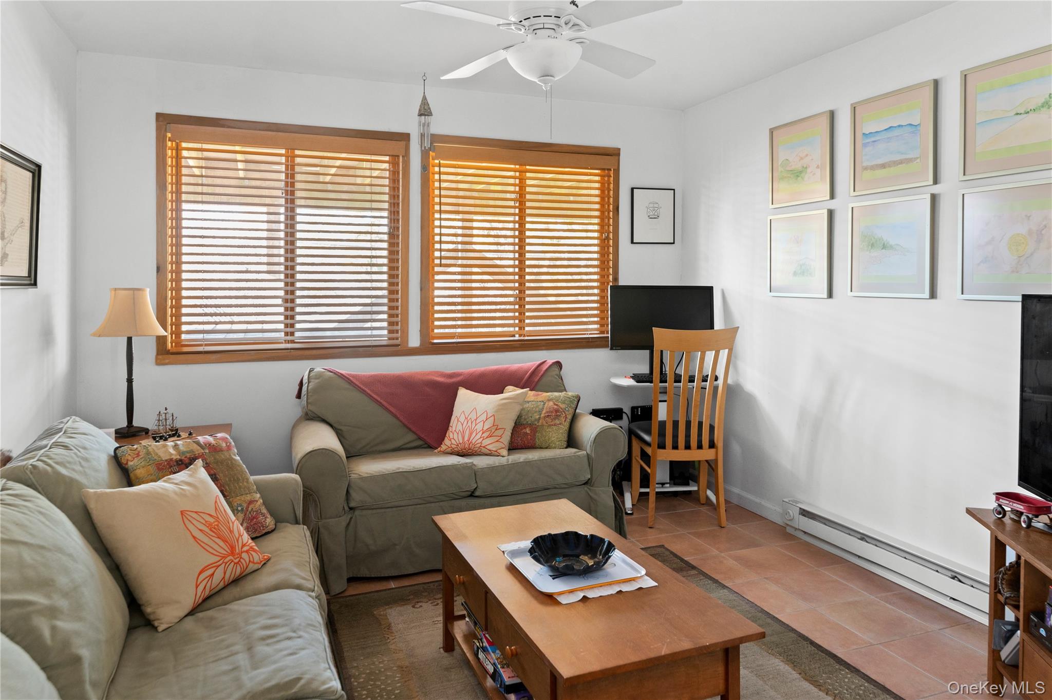 100 Clipper Way Ocean Beach, NY 11770 - Photo 12 of 46 a living room with furniture and a window